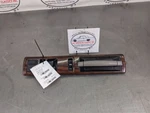 1996 Caprice Passengers Side Front Door Handle / Lock Bezel, Walnut - Oem. Fixed Price $124.95.