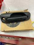 Exterior Door Handle For 01-07 Dodge Caravan Front Passenger Side Black Plastic. Fixed Price $30.00.