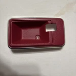 1978-1982 Corvette Nos Interior Door Latch Bezel Lh. Red. Fixed Price $23.00.